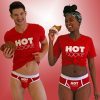 Male and female models wearing Hot Cookie signature gear and eating cookies