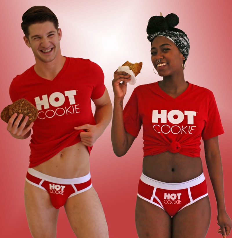 Male and female models wearing Hot Cookie signature gear and eating cookies